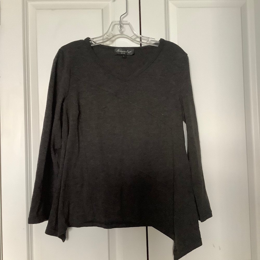 Asymmetric hem long sleeve swing sweater
